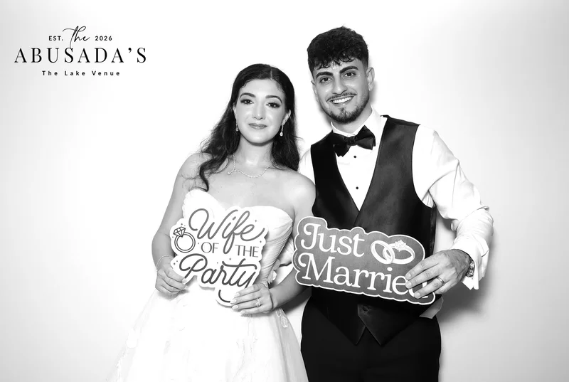 Wedding couple posing together for a black and white beauty photo booth portrait